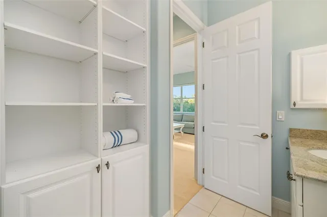 an aerial view of swimming pool patio and outdoor seating