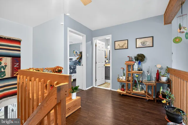 a view of a livingroom with furniture and toys