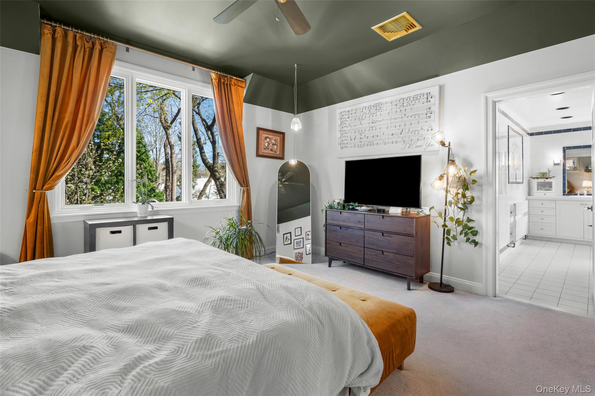 58 Burkewood Road Mount Vernon, NY 10552 - Photo 23 of 43 a bedroom with a bed and a flat screen tv