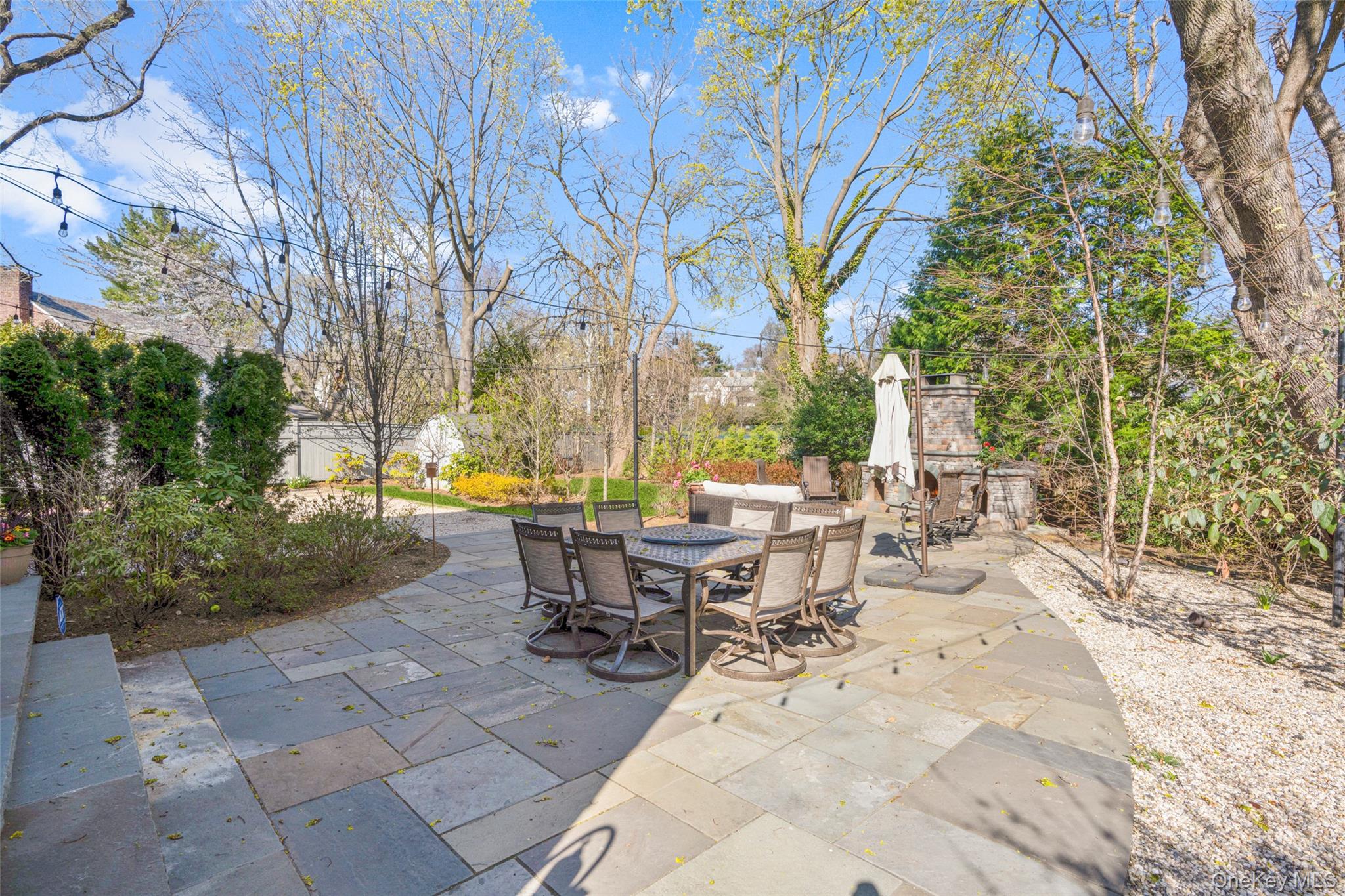 58 Burkewood Road Mount Vernon, NY 10552 - Photo 37 of 43 a view of a tables and chairs on the patio