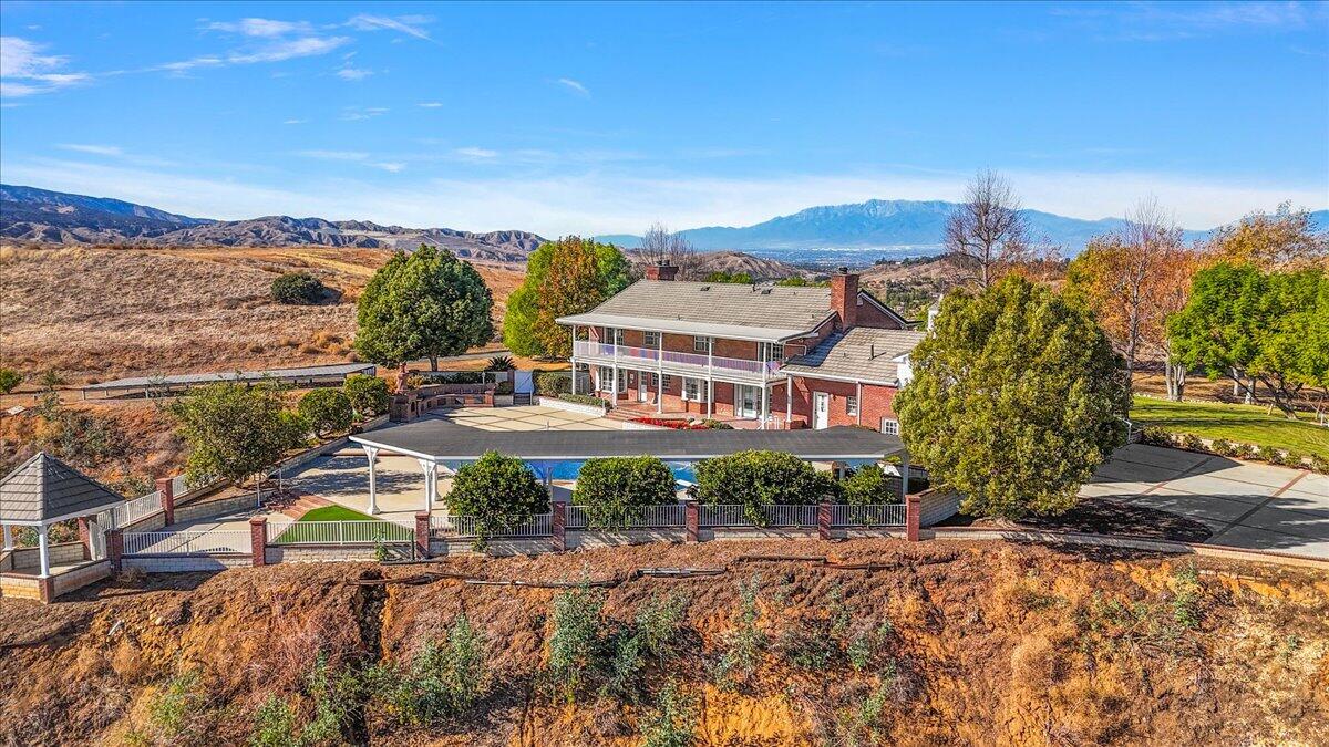 13292 Revello Road Redlands, CA 92373 - Photo 11 of 81 a view of a house with a yard