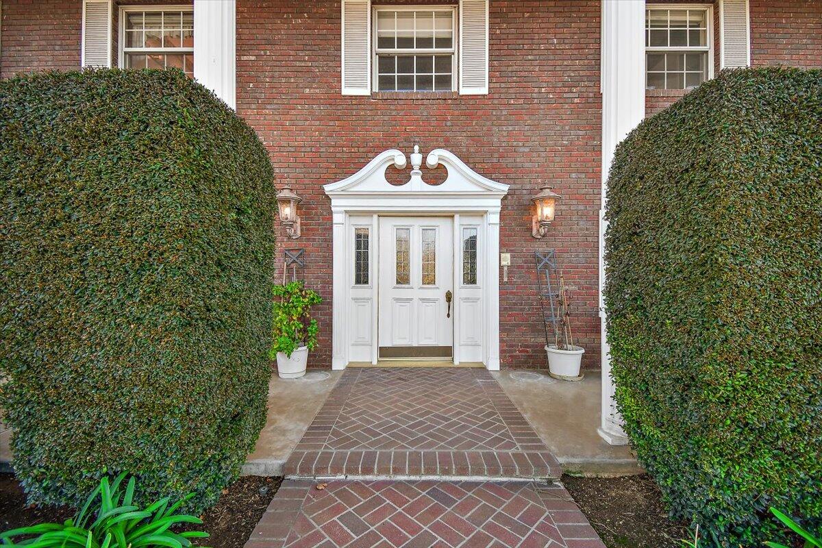 13292 Revello Road Redlands, CA 92373 - Photo 14 of 81 a front view of a house with a yard