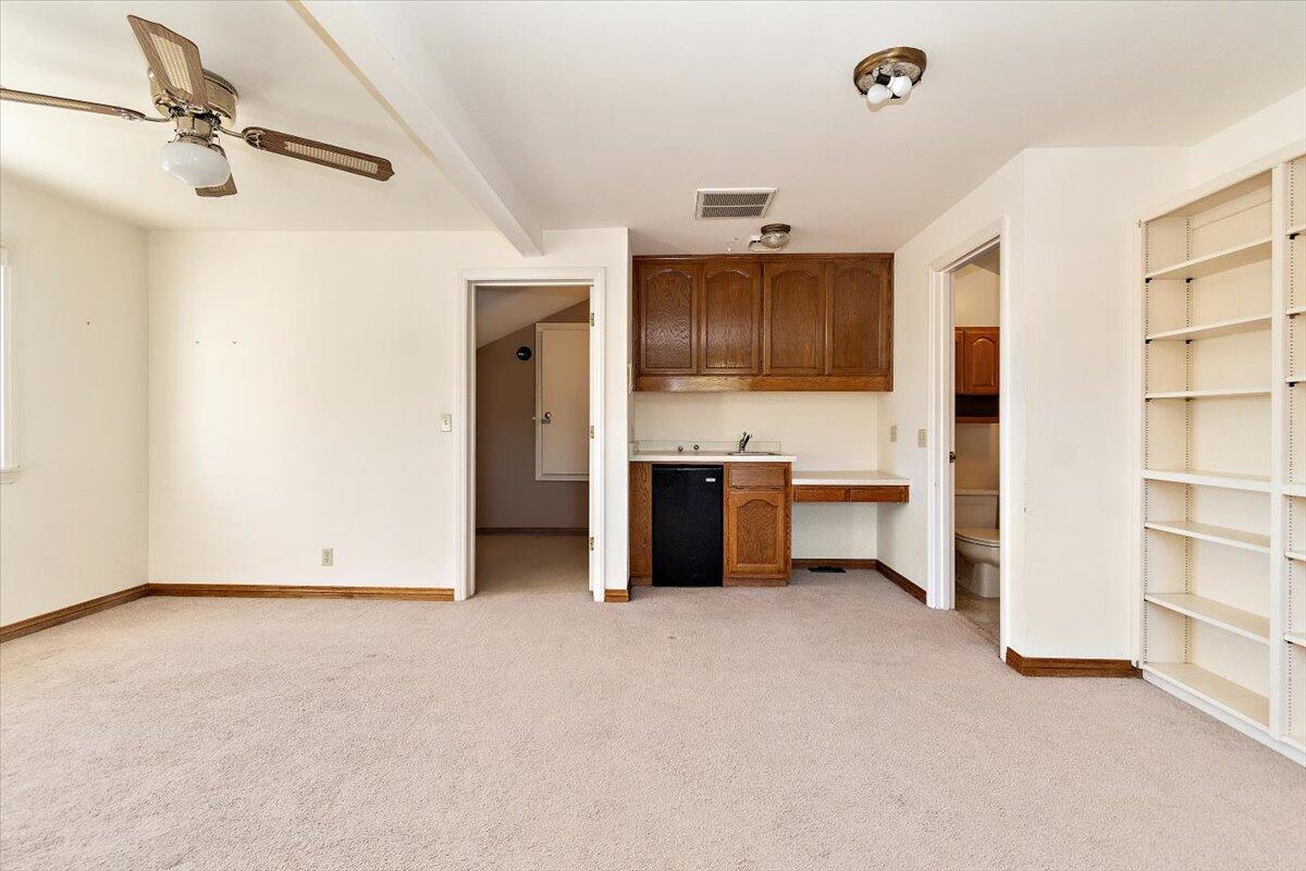 13292 Revello Road Redlands, CA 92373 - Photo 41 of 81 a view of kitchen with stainless steel appliances cabinets and a refrigerator