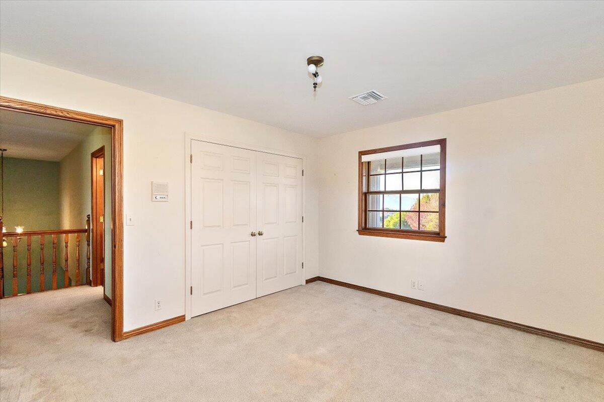 13292 Revello Road Redlands, CA 92373 - Photo 50 of 81 an empty room with windows and closet