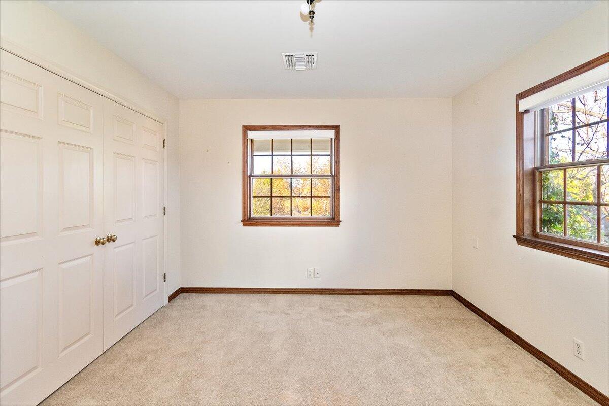 13292 Revello Road Redlands, CA 92373 - Photo 51 of 81 an empty room with windows