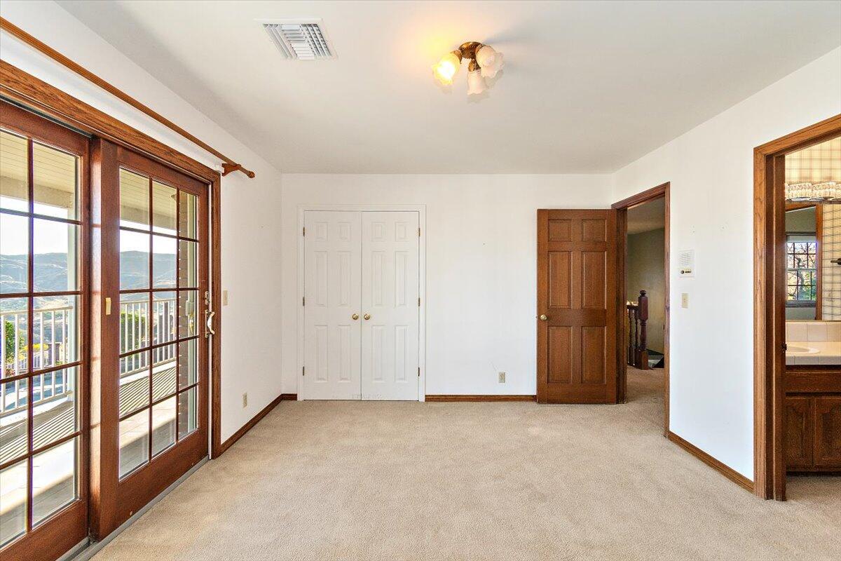 13292 Revello Road Redlands, CA 92373 - Photo 55 of 81 a view of an empty room with a window