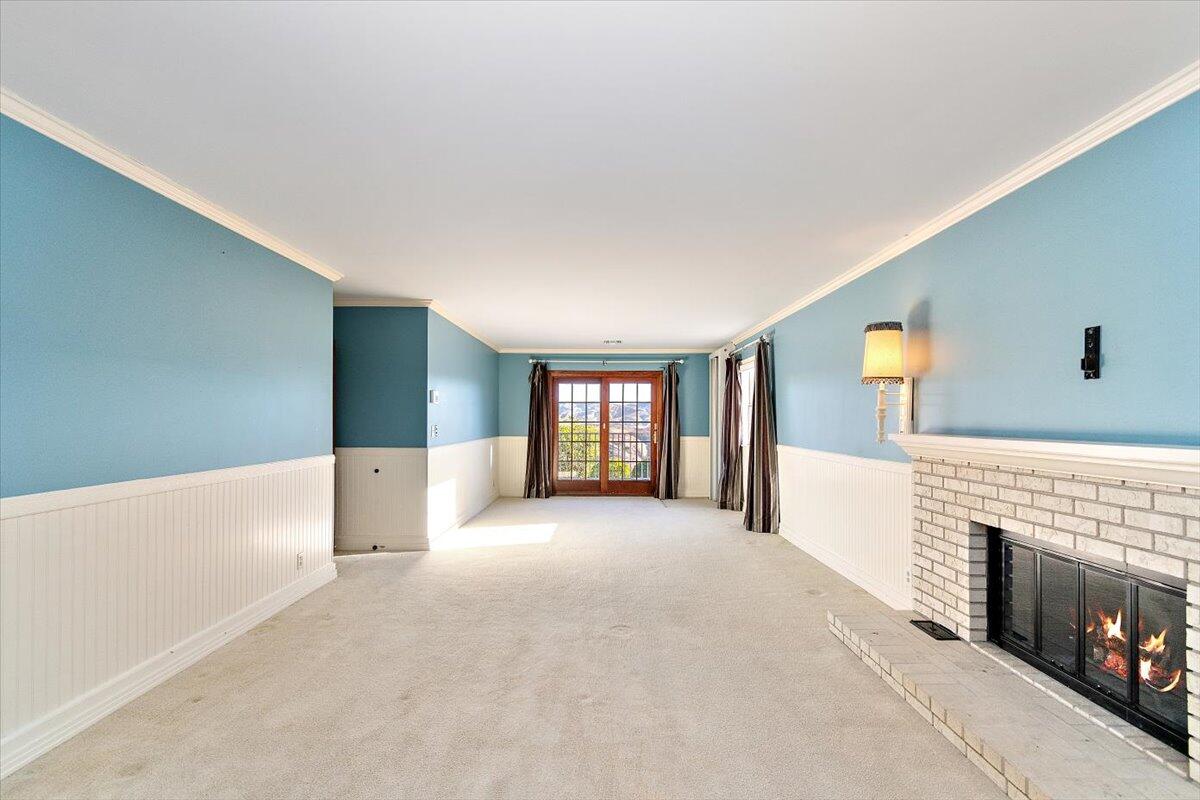 13292 Revello Road Redlands, CA 92373 - Photo 62 of 81 a view of an empty room with window and fireplace