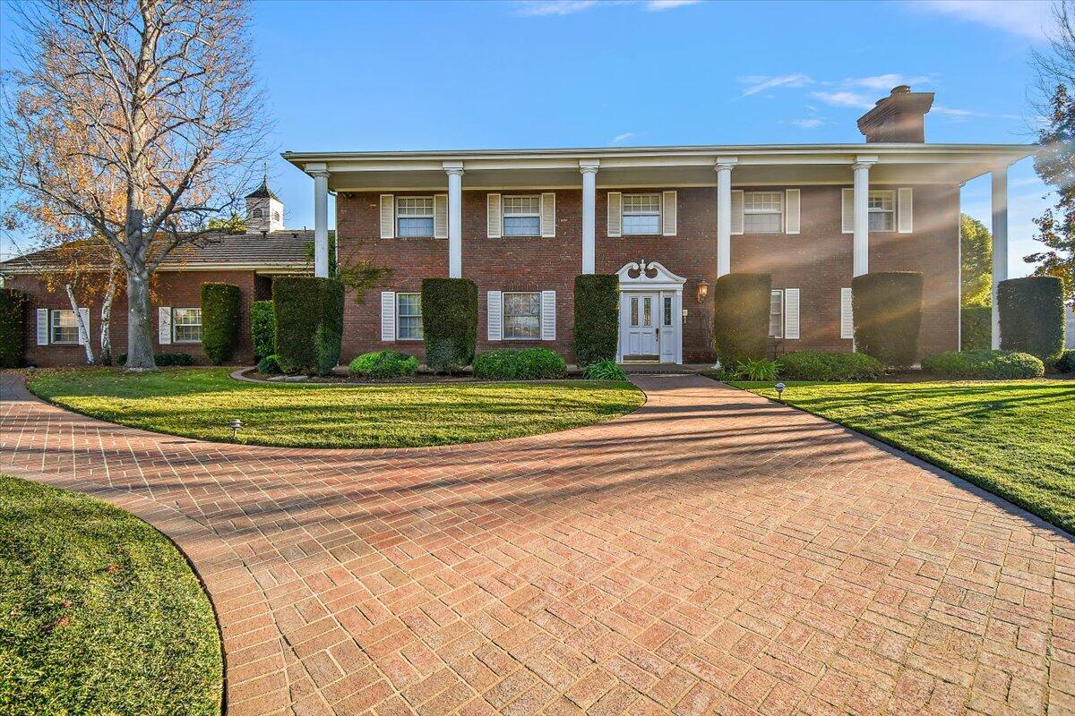 13292 Revello Road Redlands, CA 92373 - Photo 79 of 81 a front view of a house with a yard