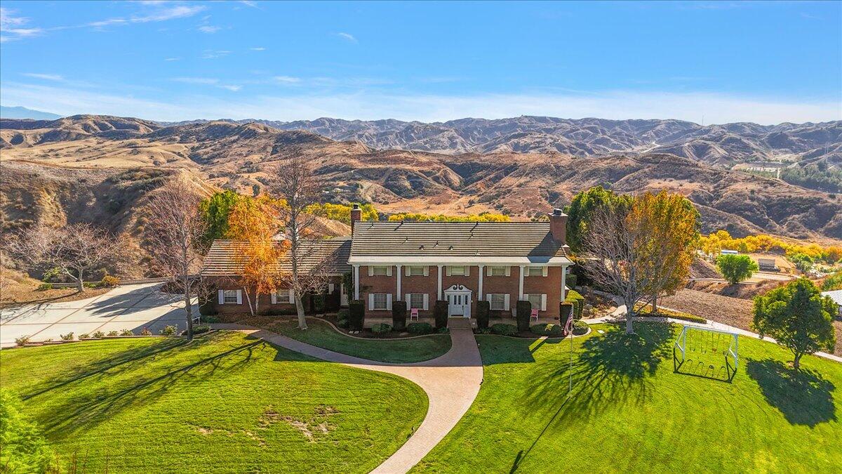 13292 Revello Road Redlands, CA 92373 - Photo 8 of 81 an aerial view of residential houses with outdoor space and city view
