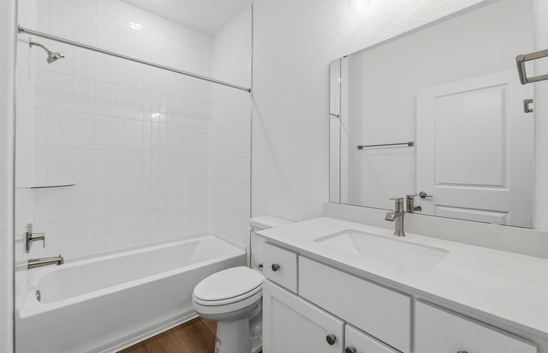 1010 Martingale Street Georgetown, TX 78633 - Photo 15 of 23 a bathroom with a sink a toilet and a bathtub