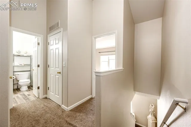 a view of entryway with bathroom