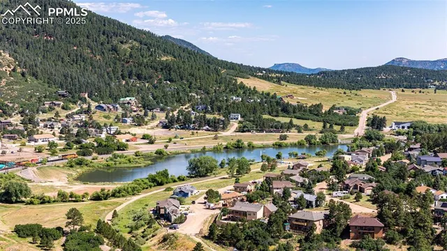 a view of lake with mountain