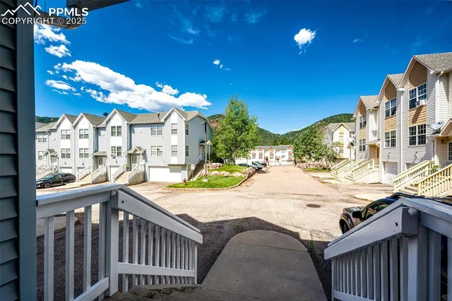 a view of a swimming pool with a patio