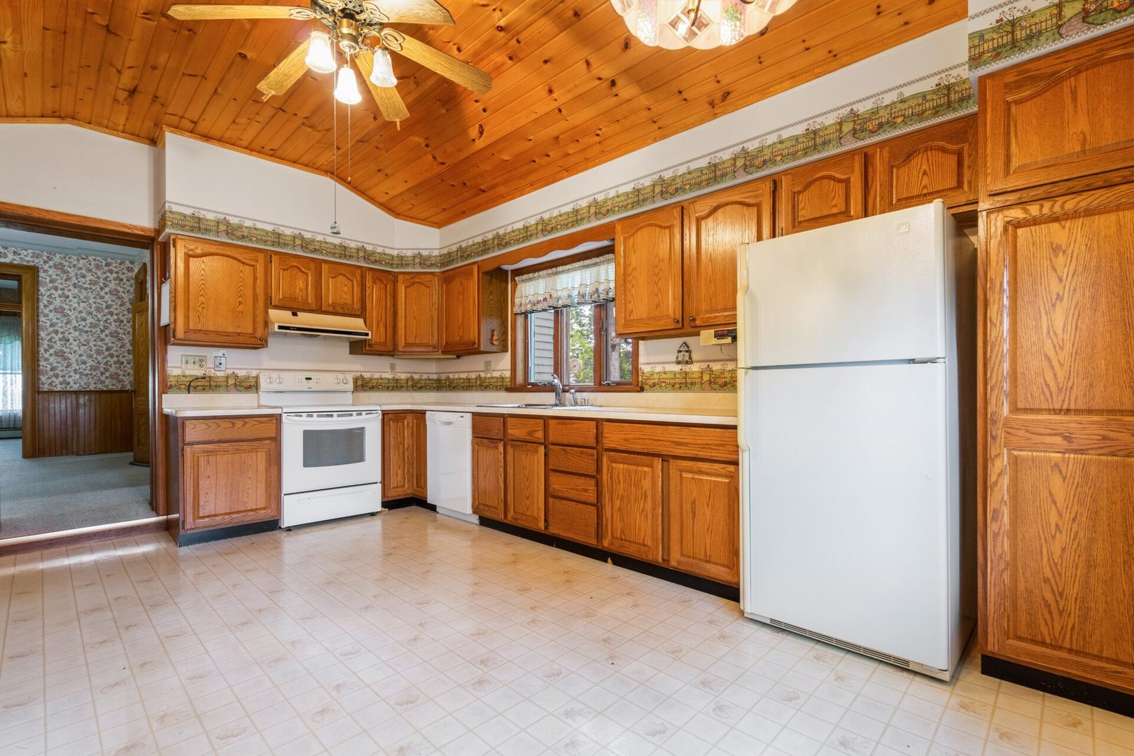 560 B Vilmin Road Plano, IL 60545 - Photo 12 of 36 a kitchen with stainless steel appliances granite countertop a refrigerator a oven a sink with dishwasher and cabinets