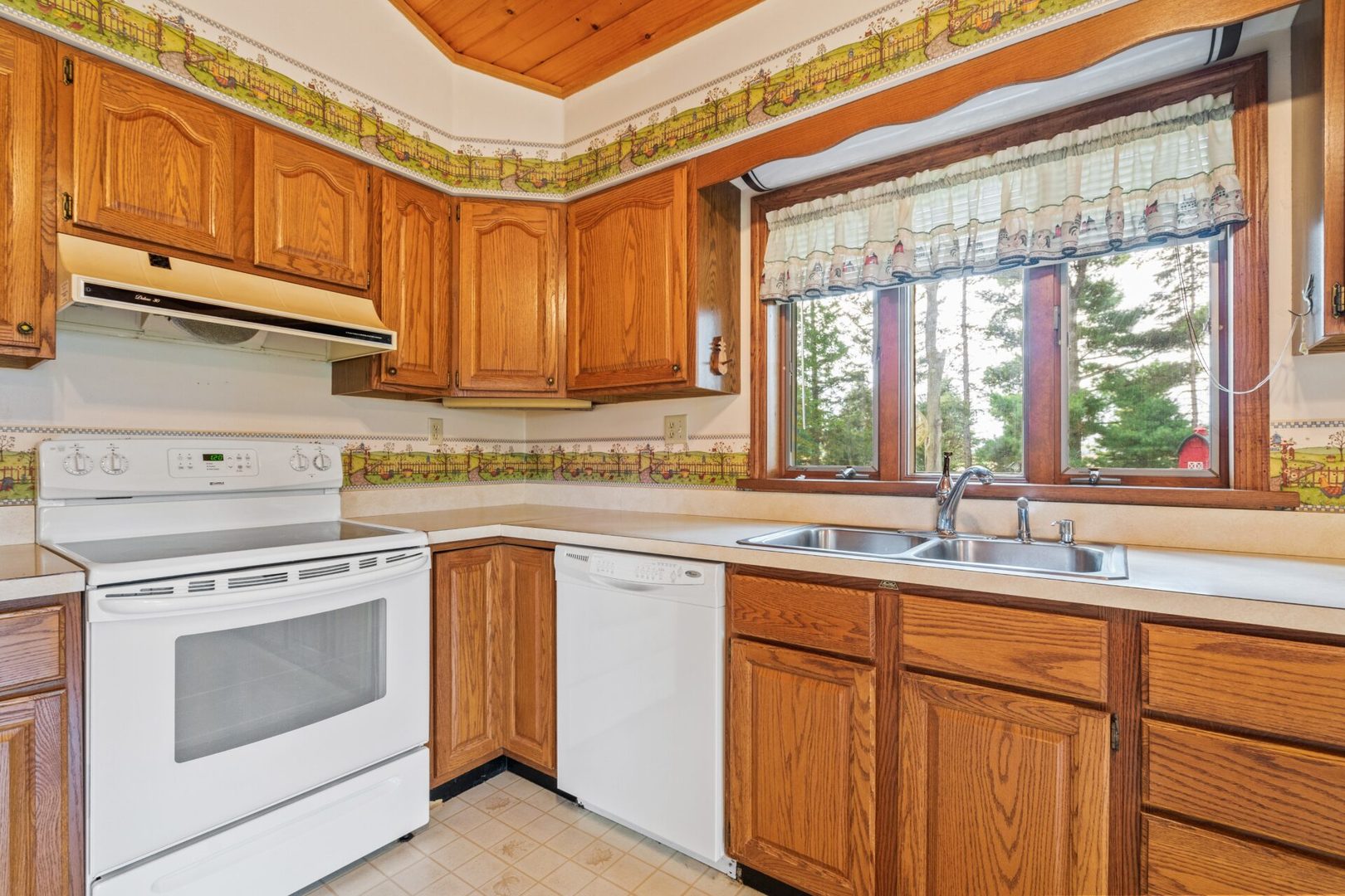 560 B Vilmin Road Plano, IL 60545 - Photo 13 of 36 a kitchen with stainless steel appliances granite countertop a sink a stove and cabinets