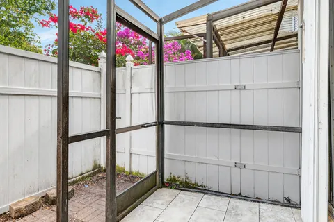 a kitchen with a sink stove and refrigerator