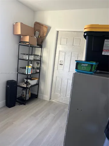 a view of a livingroom with furniture and empty room