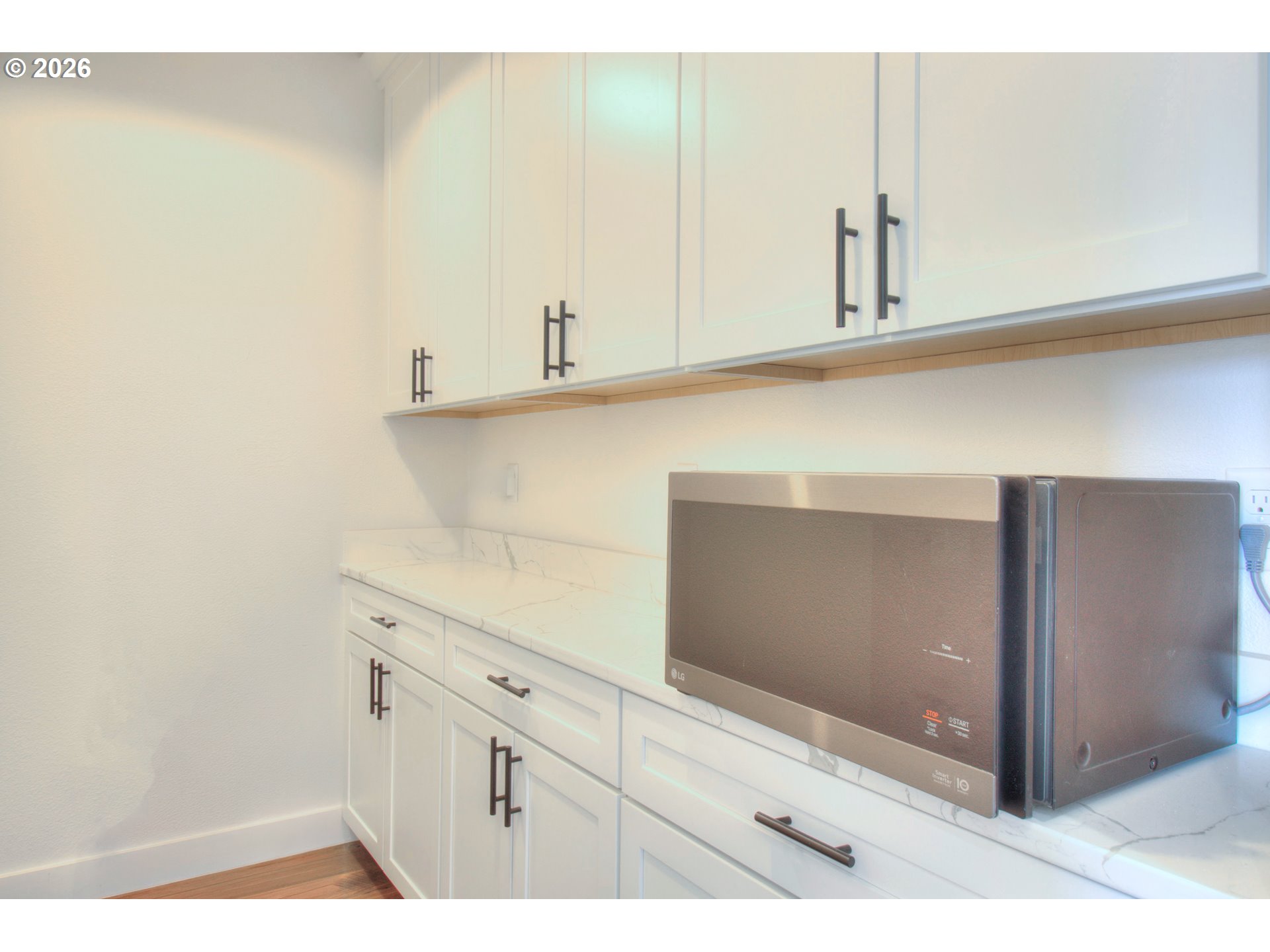 95660 Spirit Ridge Road Gold Beach, OR 97444 - Photo 12 of 34 a view of cabinets and wooden floor
