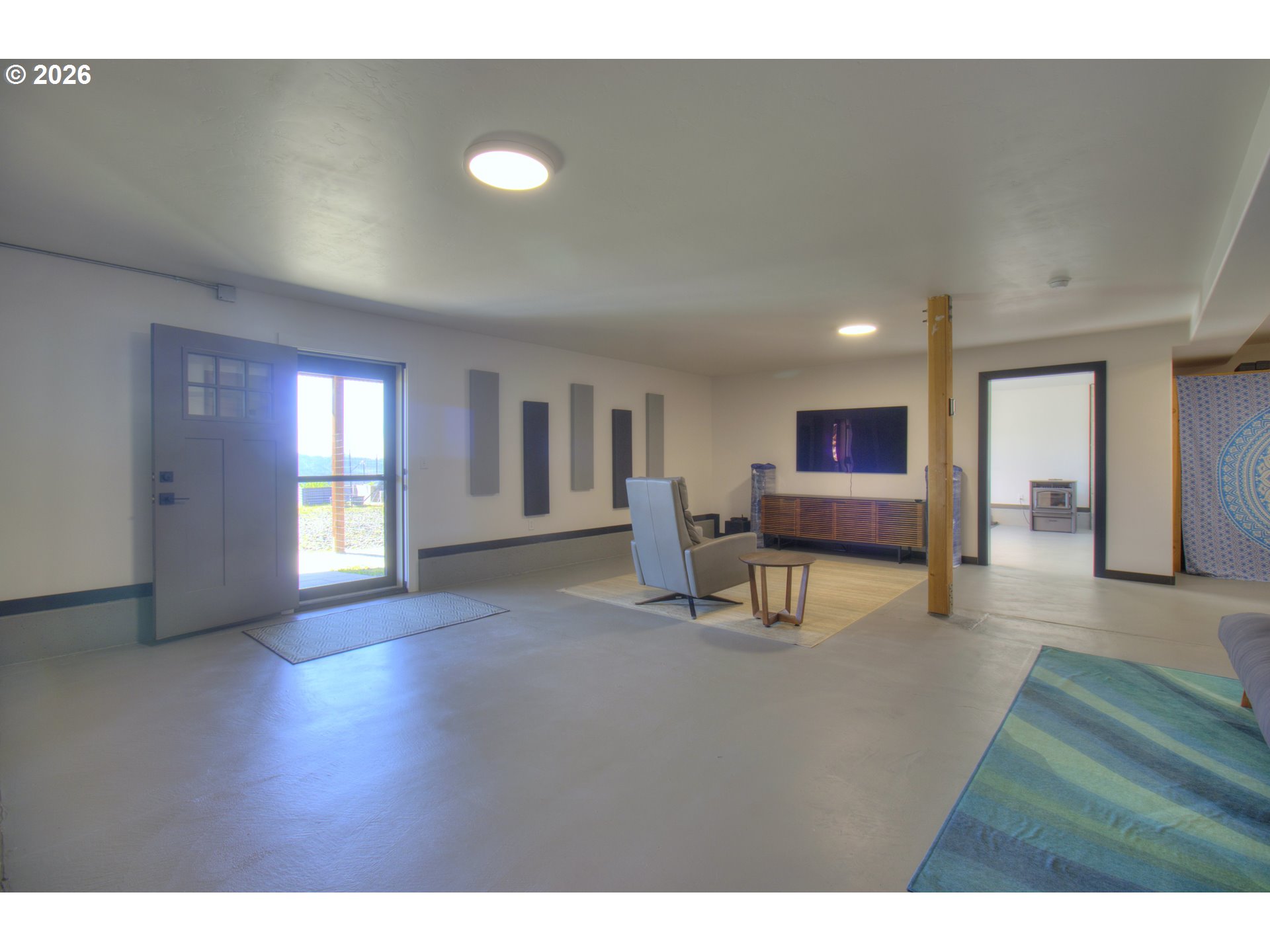 95660 Spirit Ridge Road Gold Beach, OR 97444 - Photo 24 of 34 a view of a livingroom with furniture and a window