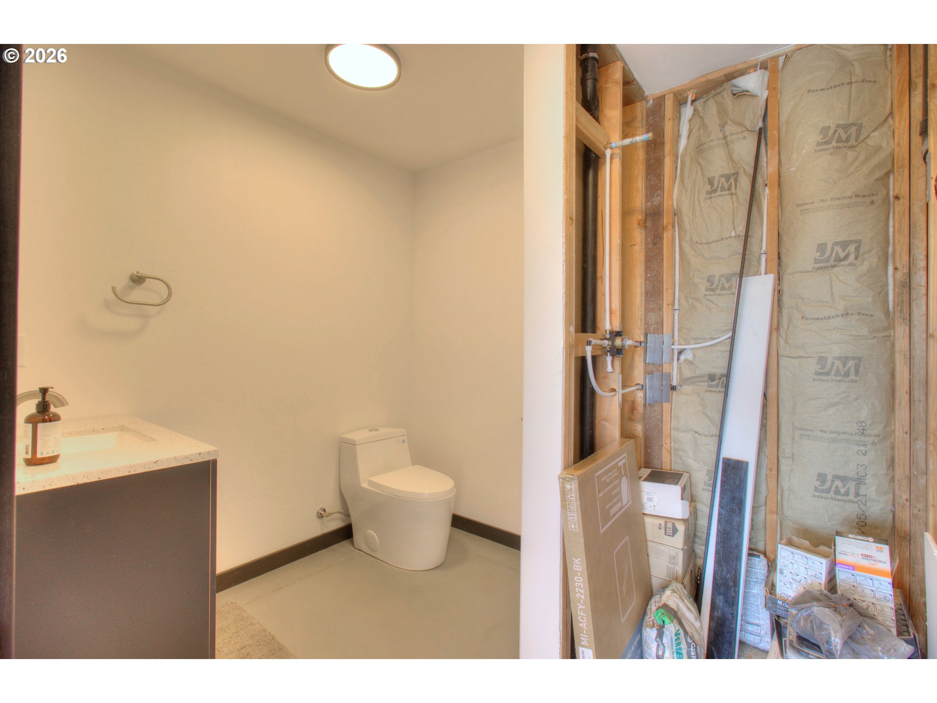 95660 Spirit Ridge Road Gold Beach, OR 97444 - Photo 26 of 34 a bathroom with a sink and a mirror