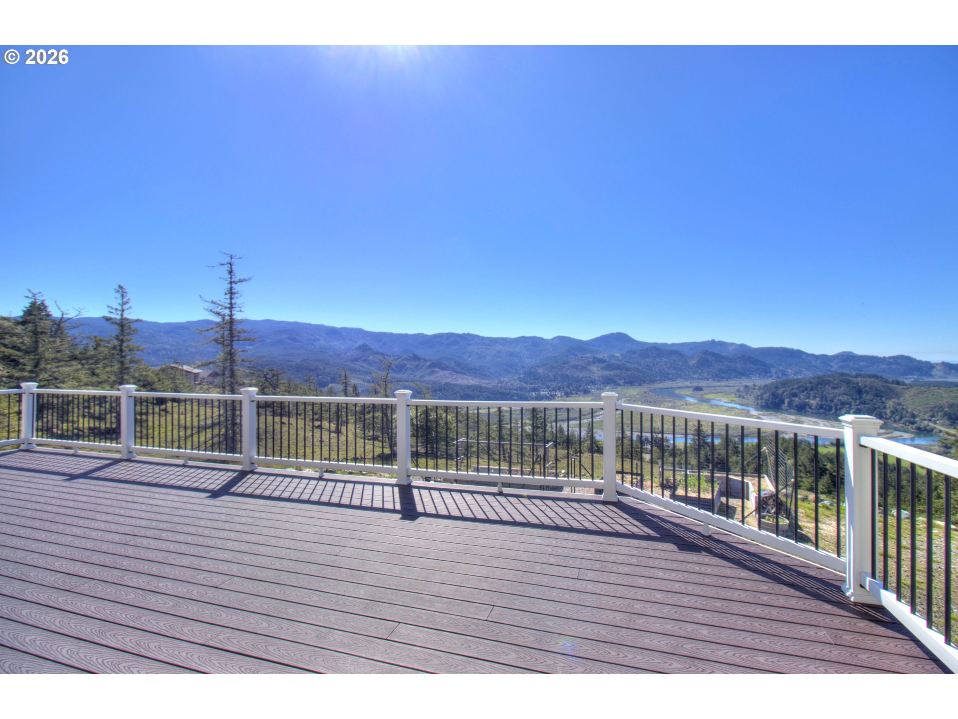 95660 Spirit Ridge Road Gold Beach, OR 97444 - Photo 32 of 34 a view of house with ocean view