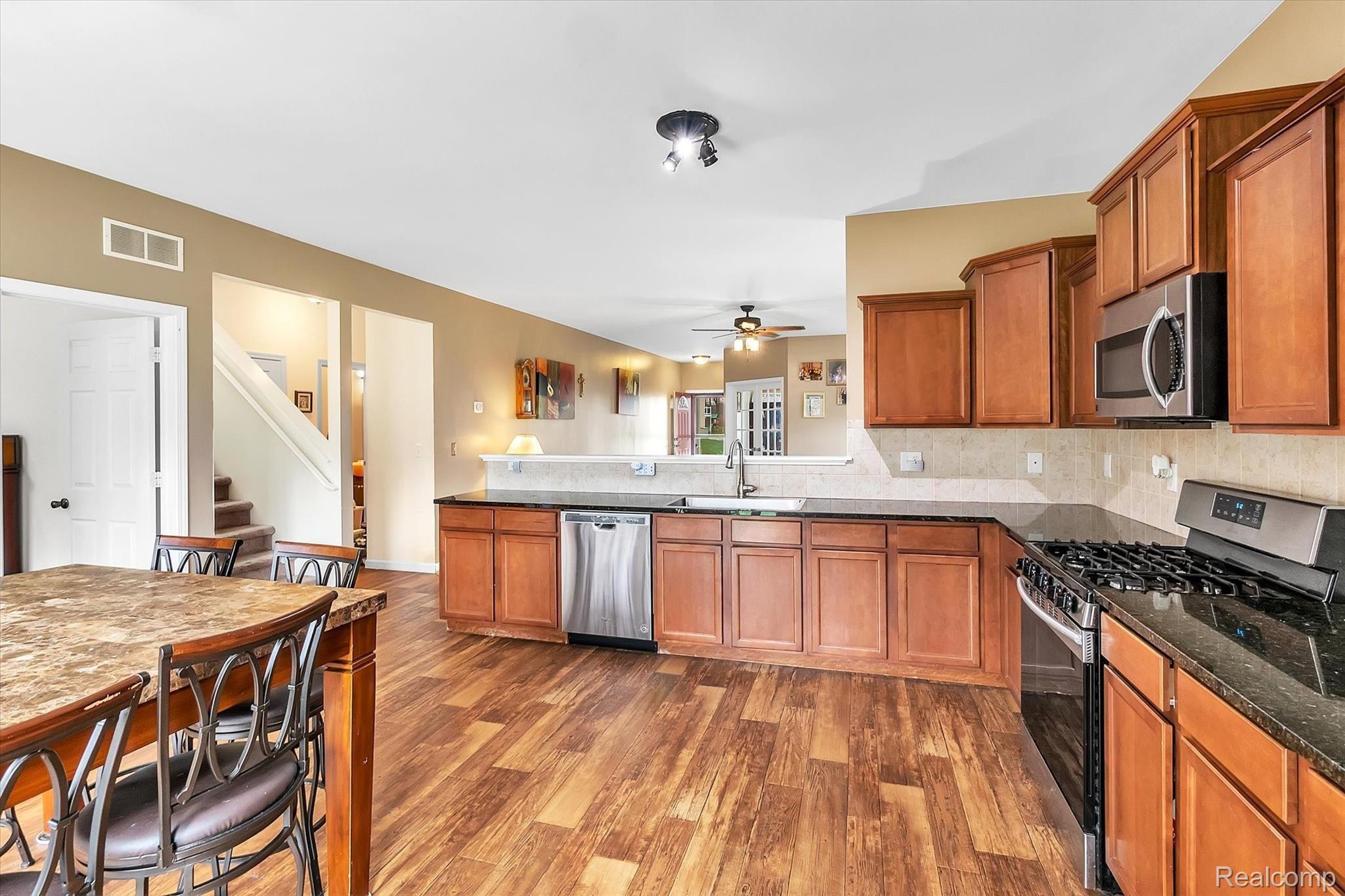 749 Dewars Street Howell, MI 48843 - Photo 11 of 39 View of kitchen featuring stainless steel appliances