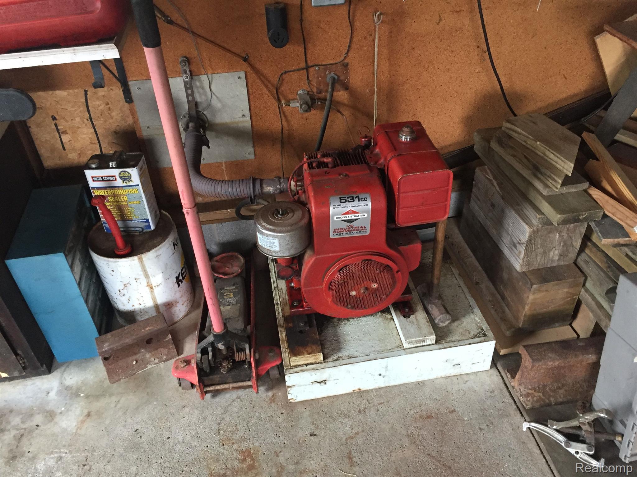 5657 Cribbins Road Avoca, MI 48006 - Photo 54 of 66 Whole house generator that vents out to the garage