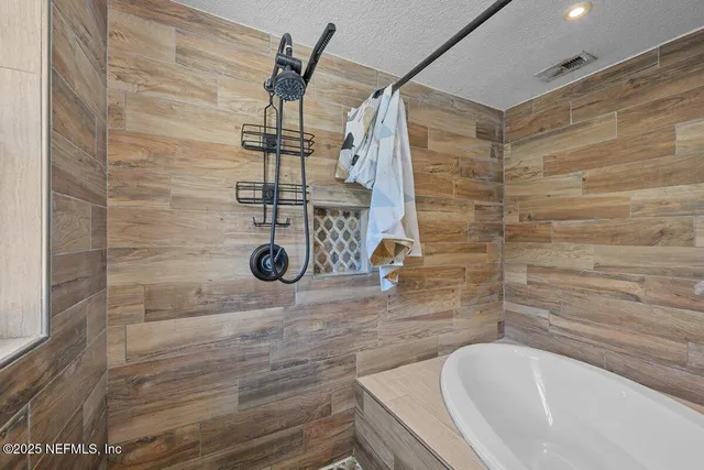 a bathroom with a bathtub