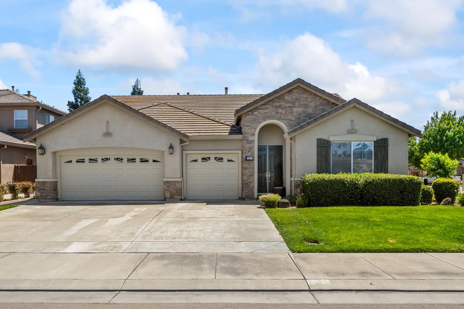 192 Sea Gull Court Ripon, CA 95366 - Photo 1 of 1 a view of a house with a yard and garage