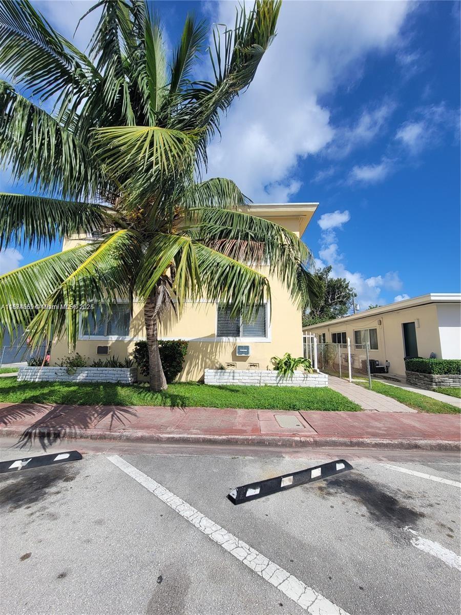 895 80th Street, Unit C Miami Beach, FL 33141 - Photo 1 of 4 a view of a volley ball court