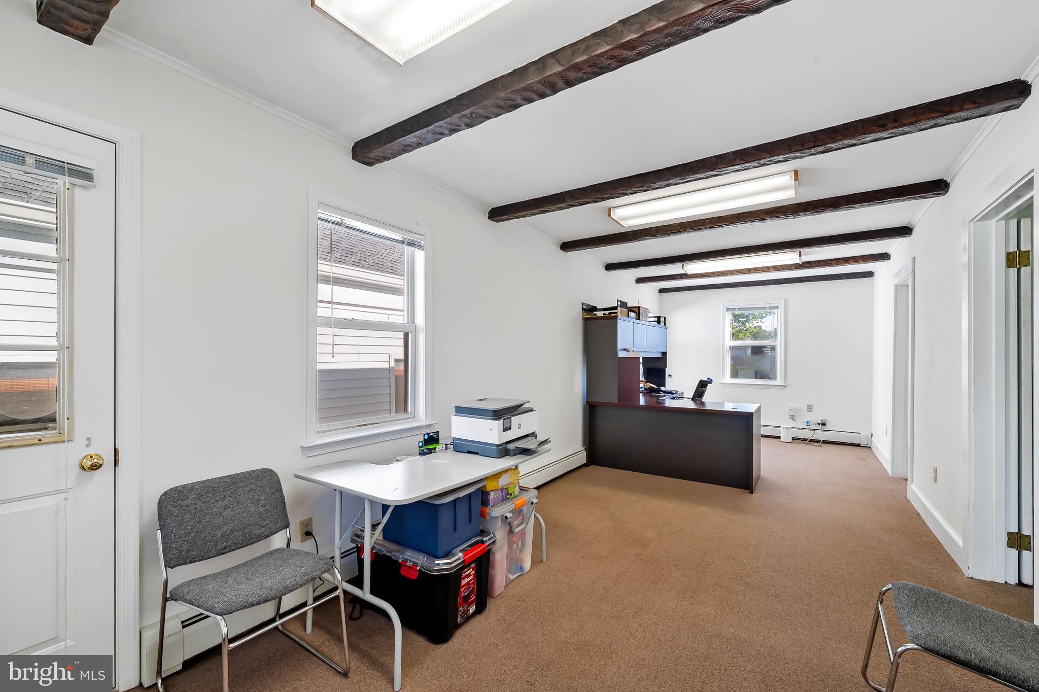 315 Brick Church Road Davidsonville, MD 21035 - Photo 16 of 45 a living room with furniture and a window
