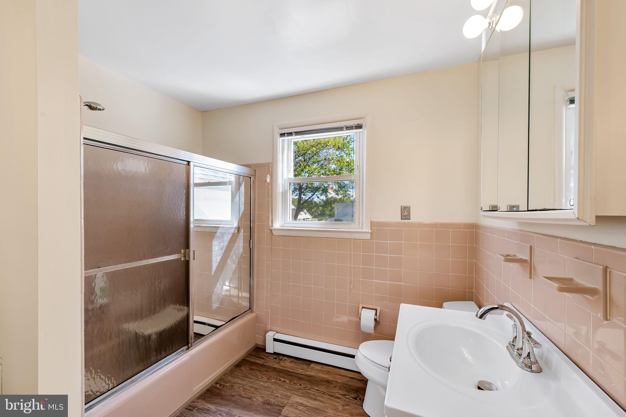 315 Brick Church Road Davidsonville, MD 21035 - Photo 18 of 45 a bathroom with a sink toilet and shower
