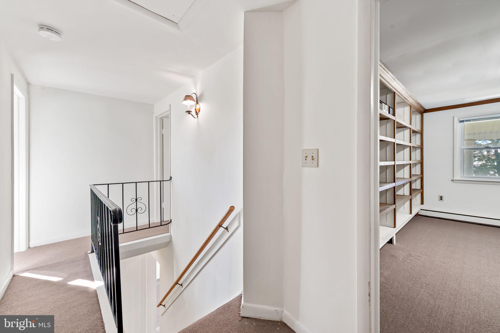315 Brick Church Road Davidsonville, MD 21035 - Photo 19 of 45 a view of a hallway with wooden floor and entryway