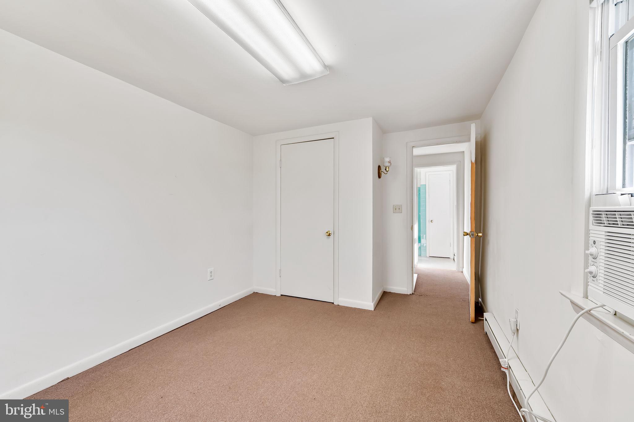 315 Brick Church Road Davidsonville, MD 21035 - Photo 23 of 45 a view of a room with a hallway