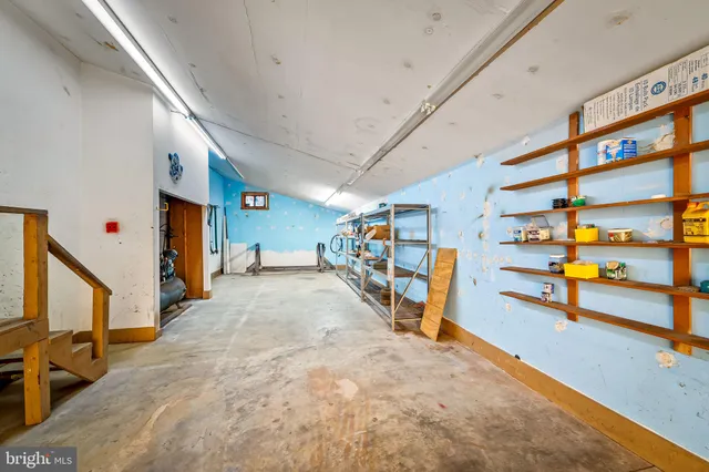 a view of a hallway with stairs