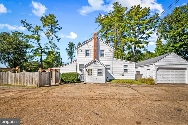 a front view of a house with a garage
