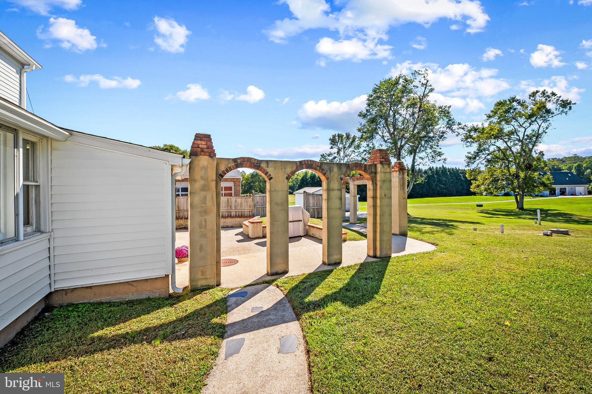 315 Brick Church Road Davidsonville, MD 21035 - Photo 6 of 45 a view of a house with a backyard