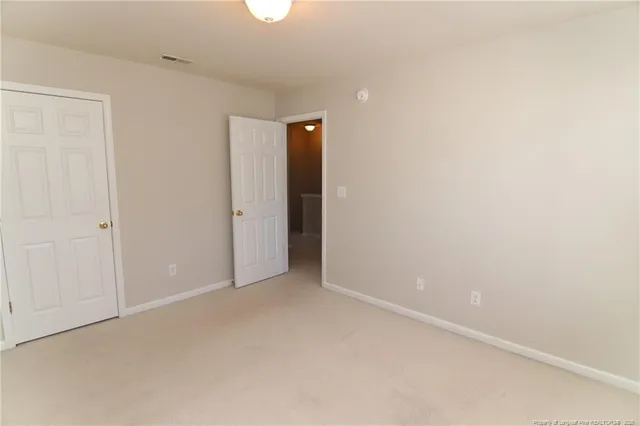 an empty room with an entryway