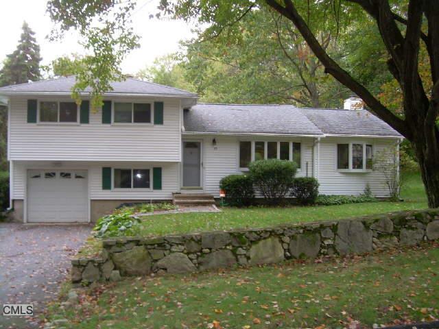37 Stonecrop Road North Norwalk, CT 06851 - Photo 1 of 1 a front view of a house with a yard