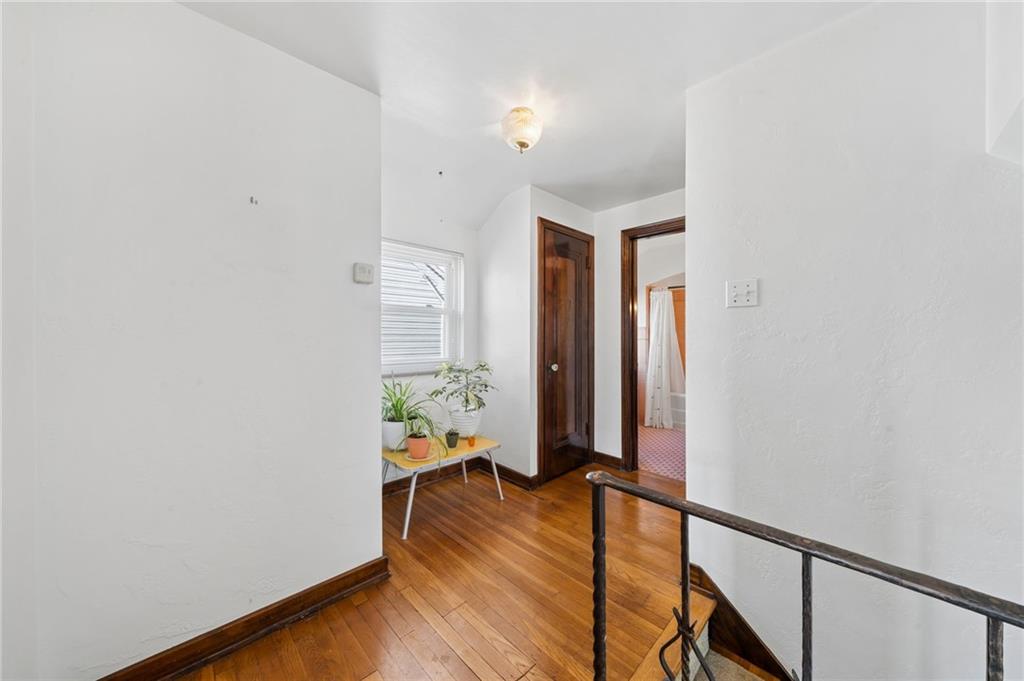 317 Raymond Street Pittsburgh, PA 15218 - Photo 18 of 36 wooden floor in an empty room