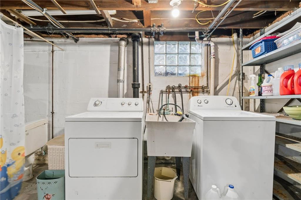 317 Raymond Street Pittsburgh, PA 15218 - Photo 29 of 36 a utility room with dryer and washer