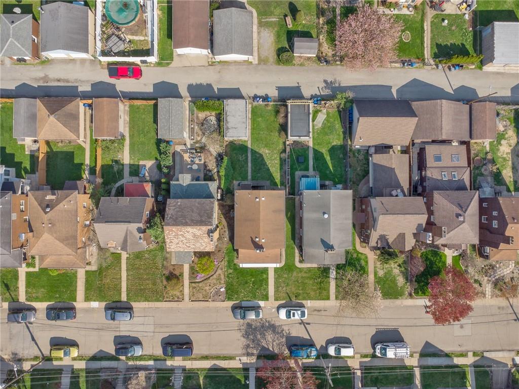 317 Raymond Street Pittsburgh, PA 15218 - Photo 34 of 36 an aerial view of multiple houses with yard