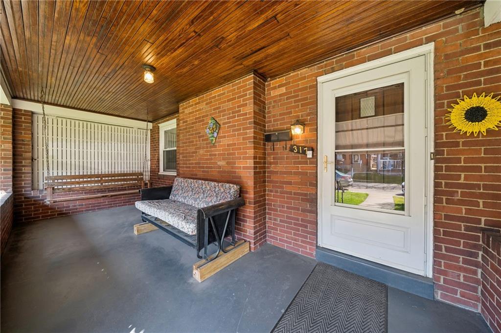 317 Raymond Street Pittsburgh, PA 15218 - Photo 4 of 36 a outdoor living space with couch