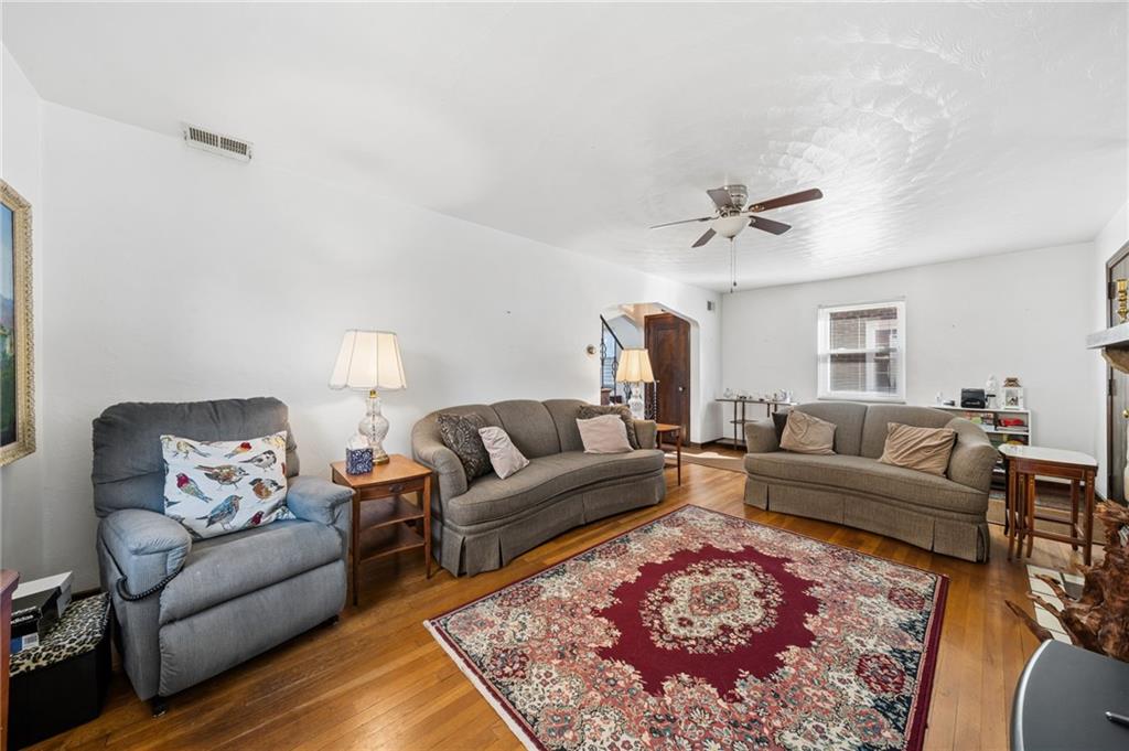 317 Raymond Street Pittsburgh, PA 15218 - Photo 6 of 36 a living room with furniture and a rug