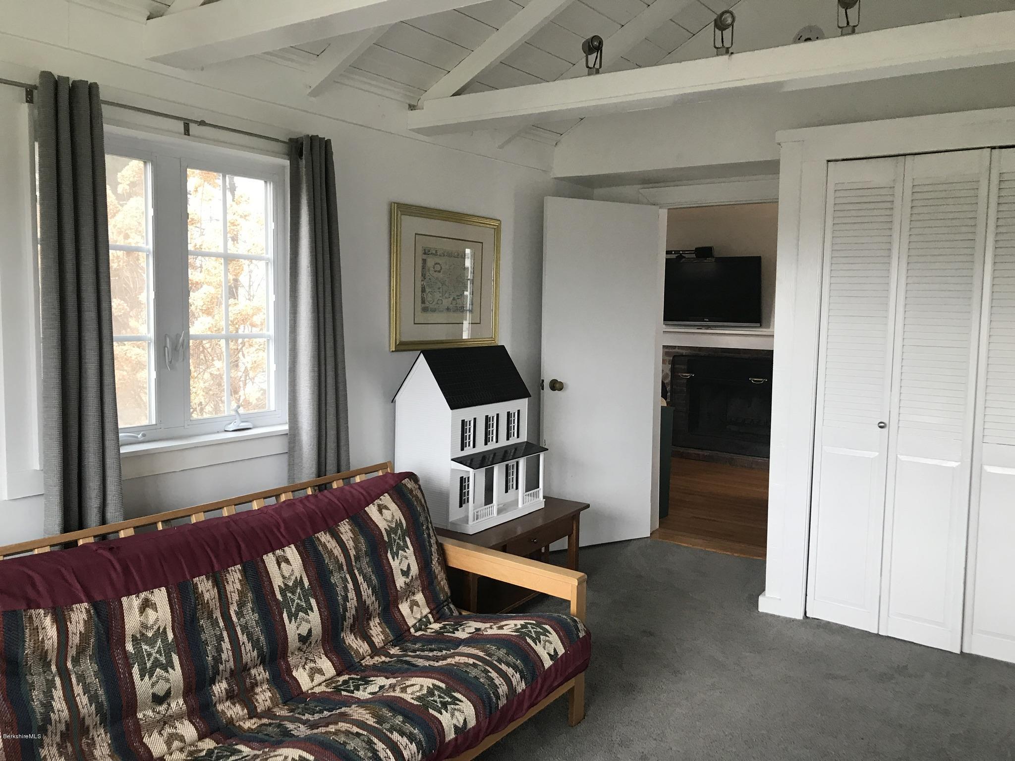 1679 Swamp Road Richmond, MA 01254 - Photo 14 of 33 a bedroom with furniture and a window
