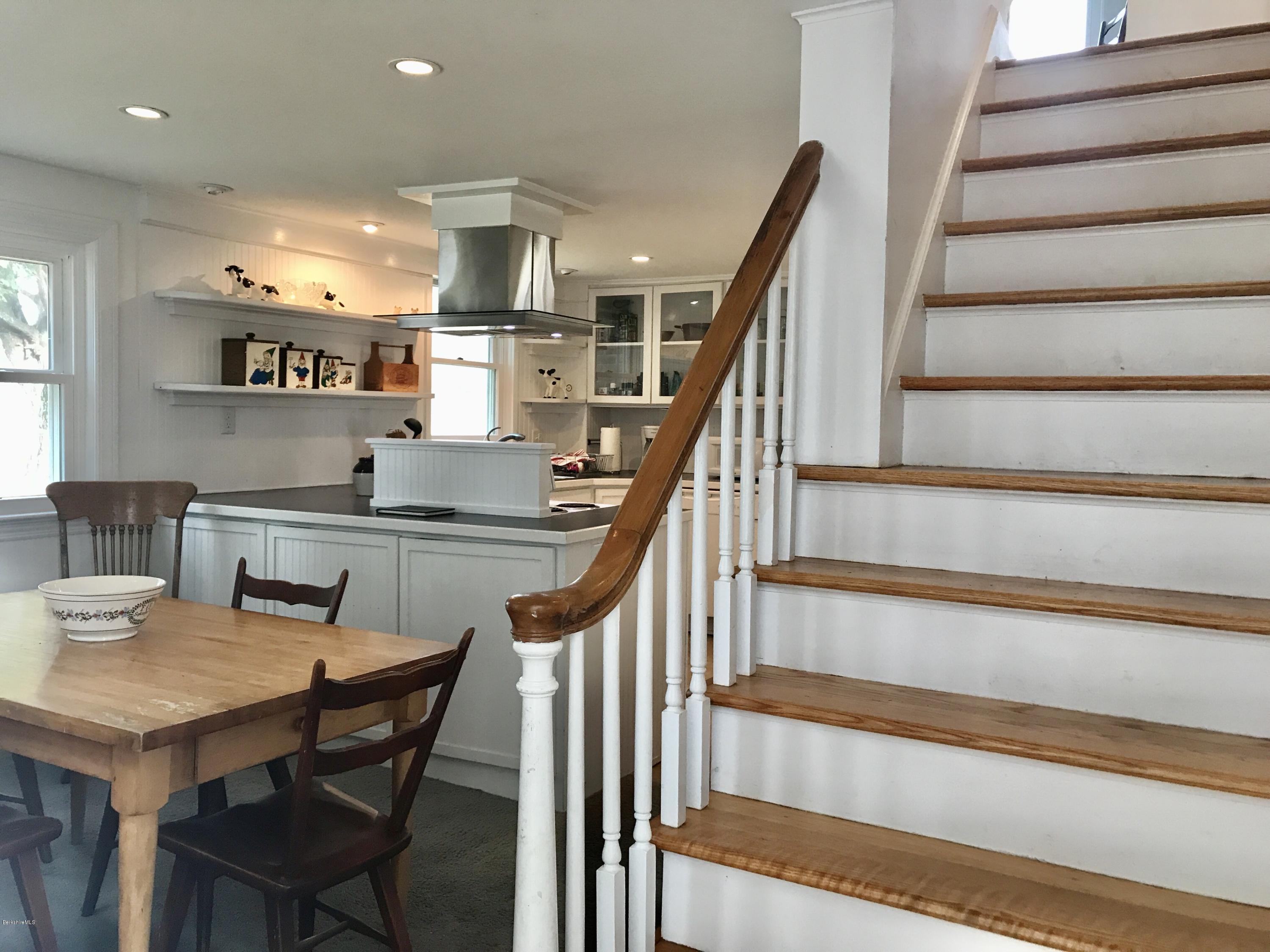 1679 Swamp Road Richmond, MA 01254 - Photo 16 of 33 a view of kitchen and dining room with furniture