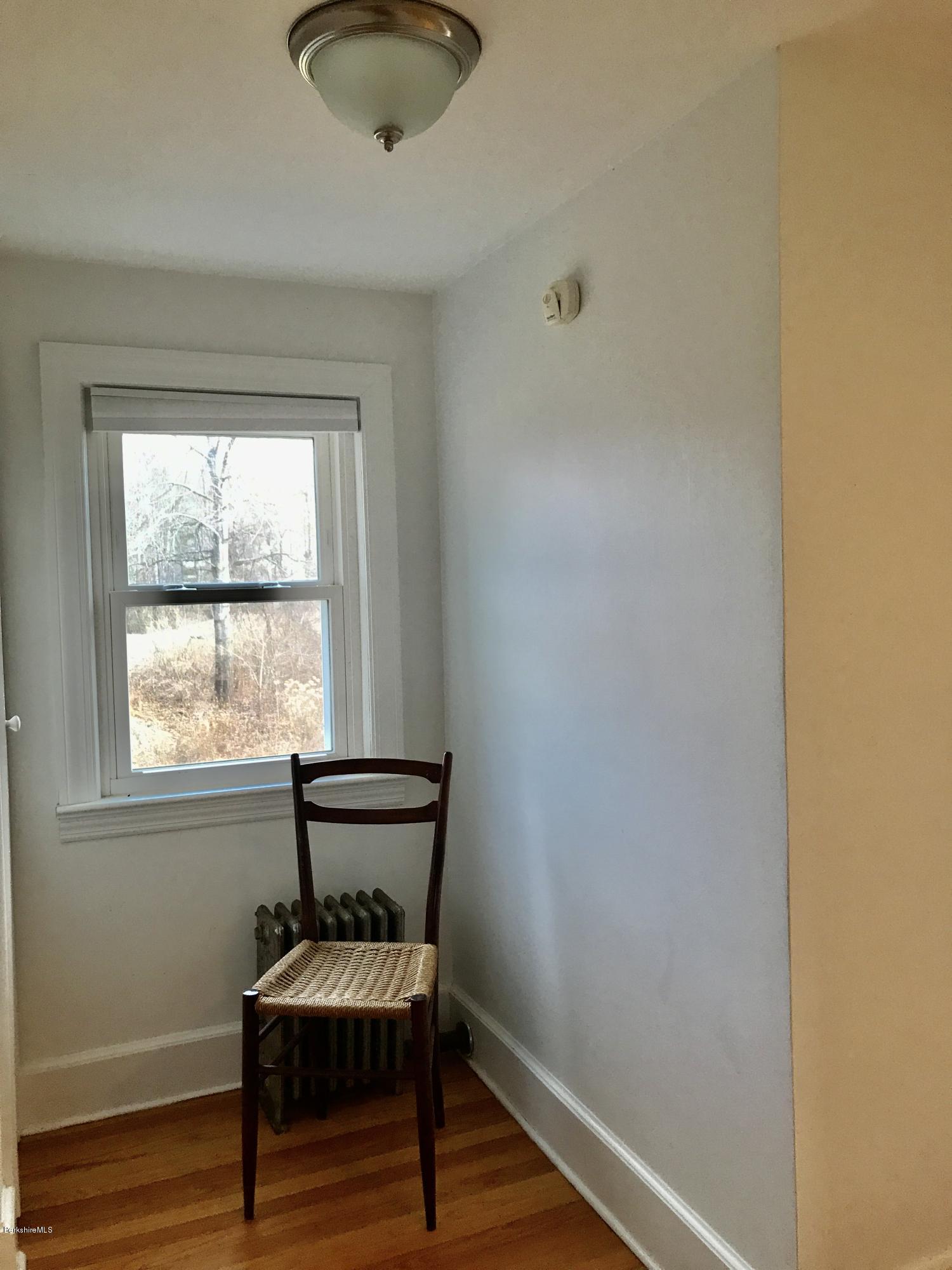 1679 Swamp Road Richmond, MA 01254 - Photo 23 of 33 a view of a room with a window and wooden floor