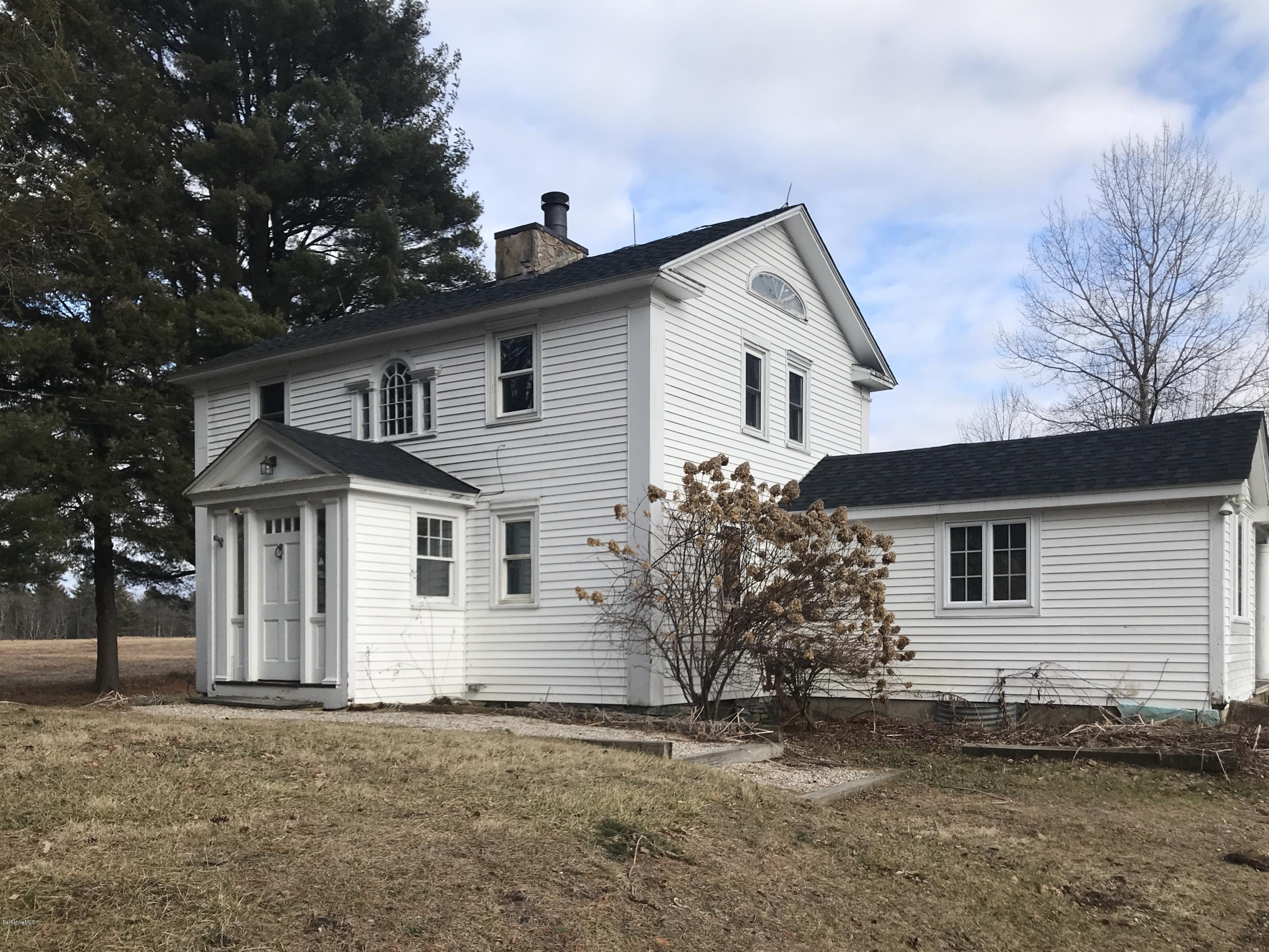 1679 Swamp Road Richmond, MA 01254 - Photo 5 of 33 front view of a house with a yard