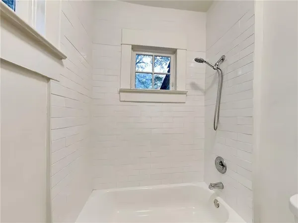a bathroom with a bathtub