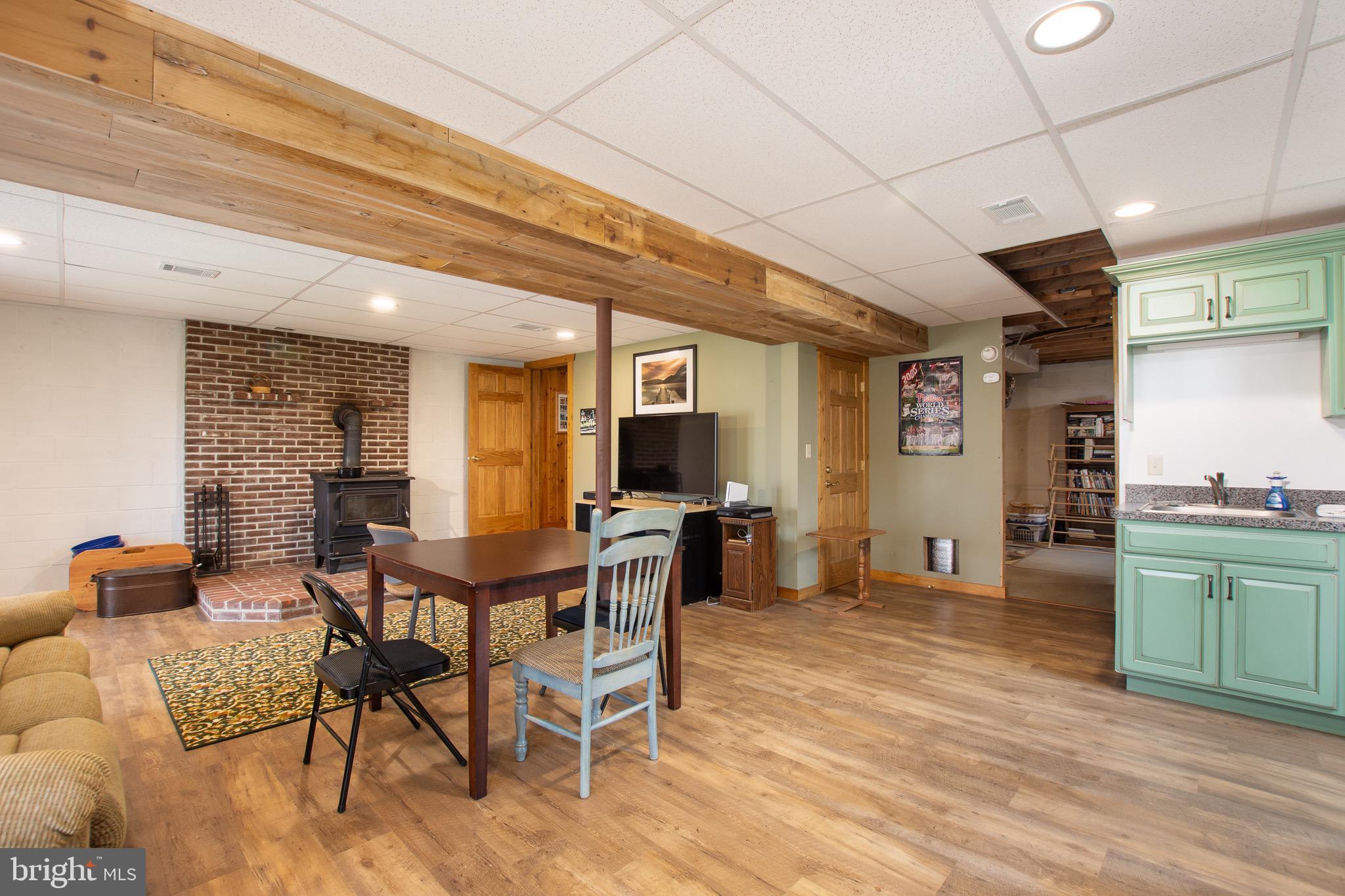 232 Wesley Road Quarryville, PA 17566 - Photo 47 of 69 lower level with brick hearth